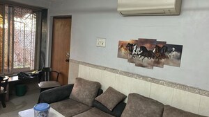 Living Room in 2 BHK Apartment at Everard CHS, Sion – for Sale