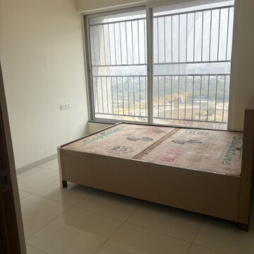 Bedroom in 1 BHK Apartment at Kolte Patil Life Republic Oro Avenue, Kasarsai – for Rent