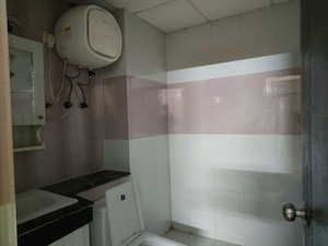 Bathroom in 3 BHK Apartment at Purvanchal Royal Park, Sector 137 – for Rent