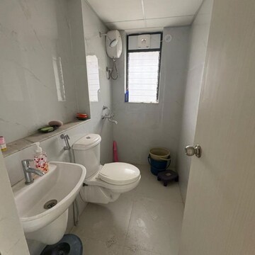Bathroom in 1 BHK Apartment at Runwal Gardens Phase 2, Kalyan Shilphata Road – for Rent