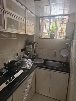 Kitchen in 1.5 BHK Apartment at Adarsh Nagar Society, Worli – for Rent