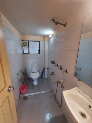 Bathroom in 2 BHK Apartment at Silver Sand CHS, Andheri West – for Rent