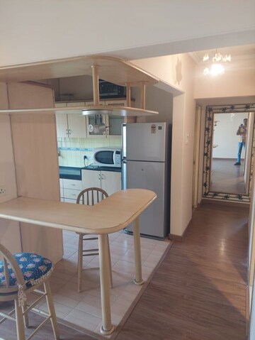 Kitchen in 2 BHK Apartment at Silver Sand CHS, Andheri West – for Rent