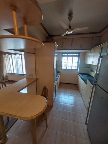 Kitchen in 2 BHK Apartment at Silver Sand CHS, Andheri West – for Rent