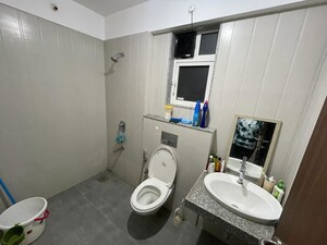 Bathroom in 2 BHK Apartment at Sheth Avalon, Laxmi Nagar – for Rent