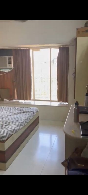 Bedroom in 2 BHK Apartment at Kumar Harshvardhan CHS, Andheri West – for Sale