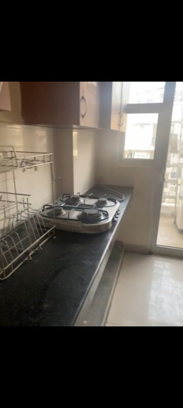 Kitchen in 2 BHK Apartment at VVIP Homes, Gaur City 2 – for Rent