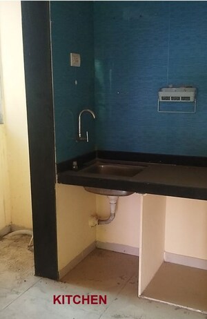 Kitchen in 2 BHK Apartment at Rose Tower, Kharghar Sector 34 – for Rent