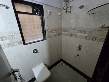 Bathroom in 2 BHK Apartment at Atul Blue Meadows, Andheri East – for Rent