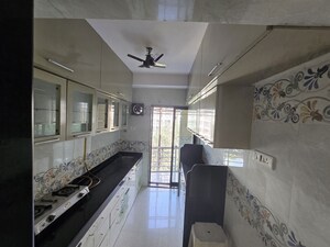 Kitchen in 2 BHK Apartment at Atul Blue Meadows, Andheri East – for Rent