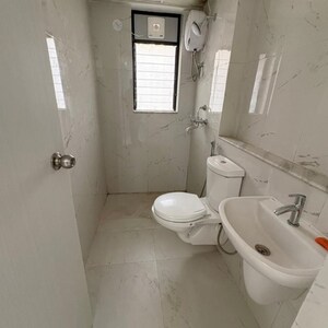 Bathroom in 1 BHK Apartment at Runwal Gardens Phase 3, Kalyan Shilphata Road – for Rent