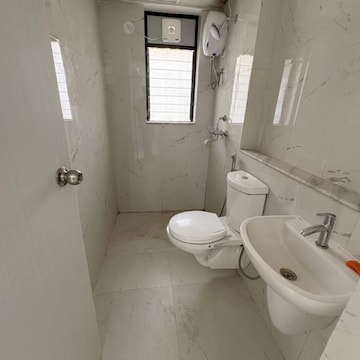 Bathroom in 1 BHK Apartment at Runwal Gardens Phase 3, Kalyan Shilphata Road – for Rent