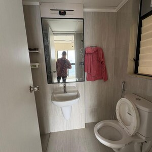 Bathroom in 1 BHK Apartment at Runwal Gardens Phase 3, Kalyan Shilphata Road – for Rent