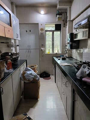 Kitchen in 2 BHK Apartment at Green Acres II CHS Ltd, Ghodbunder Road – for Rent