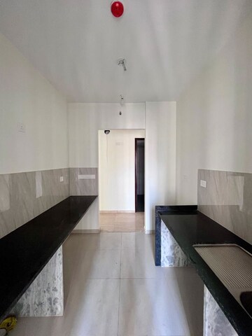 Kitchen in 2 BHK Apartment at Kalpataru Paramount A, Kapur Bawdi – for Rent