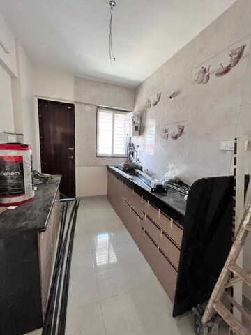 Kitchen in 1 BHK Apartment at Wadgaon Sheri – for Rent