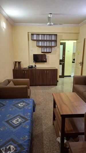 Living Room in 1 BHK Apartment at Magnolia Enclave, Powai – for Rent
