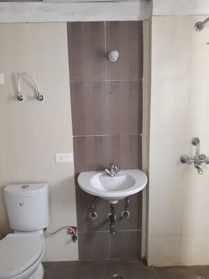 Bathroom in 3 BHK Apartment at Mahagun Mirabella, Sector 79 – for Rent