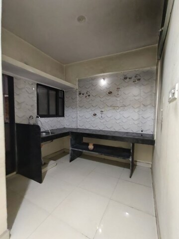 Kitchen in 1 BHK Apartment at Wadgaon Sheri – for Rent