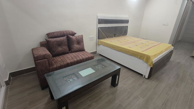 Bedroom, gaur-runway-suites Studio 460 Sq.Ft. Apartment In Gaur Yamuna City Greater Noida 9734366
