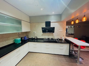 Kitchen in 3 BHK Apartment at Kolte Patil Elburz Hills Dales, Undri – for Rent