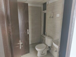 Bathroom in 2 BHK Apartment at Ajnara Panorama Facing F1, Sector 22 Yamuna Expressway – for Rent