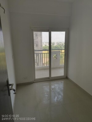 Room in 2 BHK Apartment at Ajnara Panorama Facing F1, Sector 22 Yamuna Expressway – for Rent