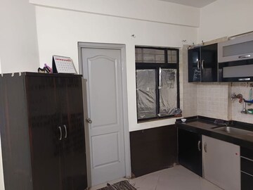 Kitchen in 3 BHK Apartment at Swaraaj Paradise, Pimple Saudagar – for Rent