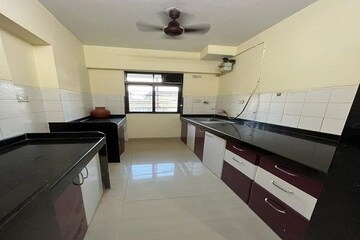 Kitchen in 2 BHK Apartment at Neptune Living Point, Bhandup West – for Rent