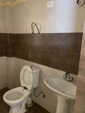 Bathroom in 2 BHK Apartment at SVP Gulmohur Garden, Raj Nagar Extension – for Sale