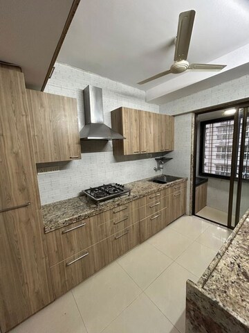 Kitchen in 2 BHK Apartment at Andheri CHS, Andheri West – for Rent