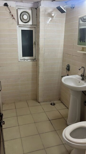 Bathroom in 2 BHK Apartment at Aims Golf Avenue II, Sector 75 – for Rent