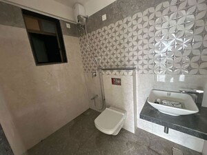 Bathroom in 2 BHK Apartment at Azad Apartment, Andheri West – for Rent