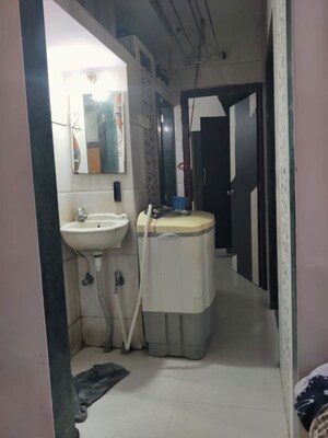 Bathroom in 2 BHK Apartment at Navnath Shraddha CHS, Dombivli West – for Rent