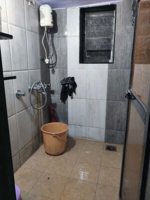 Bathroom in 2 BHK Apartment at Navnath Shraddha CHS, Dombivli West – for Rent