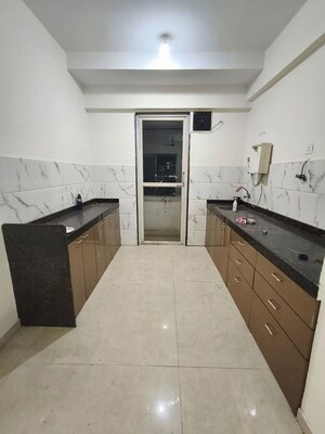 Kitchen in 3 BHK Apartment at T.T.C. Industrial Area – for Rent