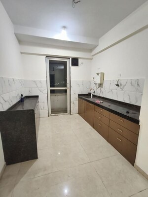 Kitchen in 3 BHK Apartment at T.T.C. Industrial Area – for Rent