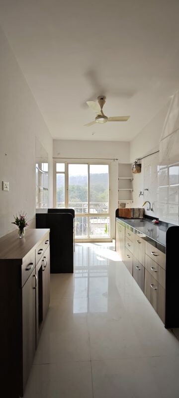 Kitchen in 2.5 BHK Apartment at Ravetkar Sukhniwas, Senapati Bapat Road – for Sale