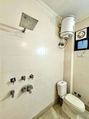 Bathroom in 1 RK Apartment at Apex Anuradha Apartments, Paschim Vihar – for Rent