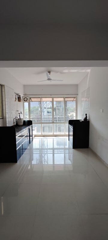 Kitchen in 2 BHK Apartment at Ravetkar Sukhniwas, Senapati Bapat Road – for Sale