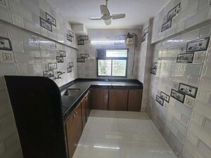 Kitchen in 2 BHK Apartment at DLH Sorrento, Veera Desai Road – for Rent