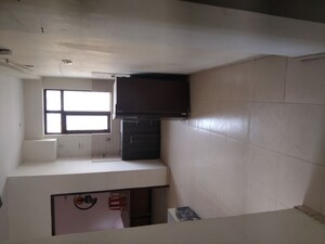 Kitchen in 1 BHK Apartment at Auric City Homes, Sector 82 – for Rent