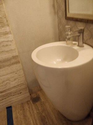 Bathroom in 4 BHK Apartment at Defence Colony – for Rent