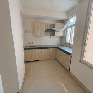 Kitchen in 2 BHK Apartment at Shree Vardhman Green Court, Sector 90 – for Rent