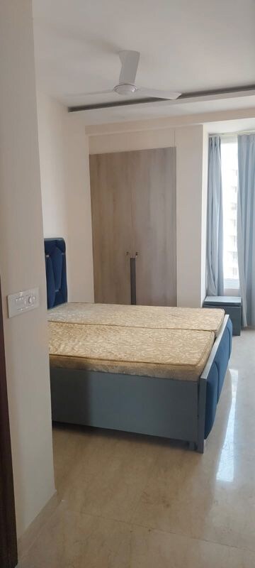 Bedroom in 3 BHK Apartment at Ambience Tiverton, Sector 50 – for Rent