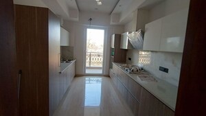 Kitchen in 4 BHK Builder Floor at Ansal API Esencia, Sector 67 – for Rent