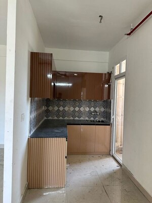 Kitchen in 2 BHK Apartment at Signature Orchard Avenue 2, Sector 93 – for Sale