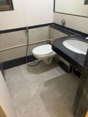 Bathroom in 2 BHK Apartment at Goyal Green Woods, Andheri East – for Rent