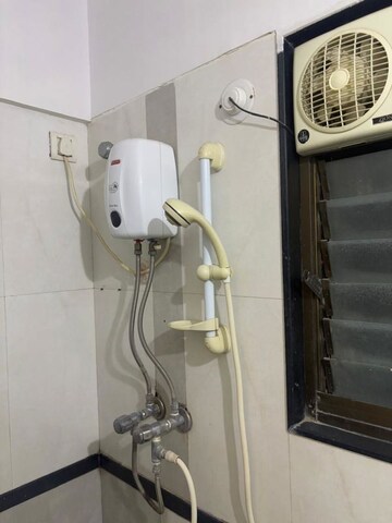 Bathroom in 2 BHK Apartment at Goyal Green Woods, Andheri East – for Rent