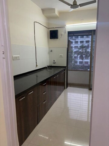 Kitchen in 2 BHK Apartment at Goyal Green Woods, Andheri East – for Rent